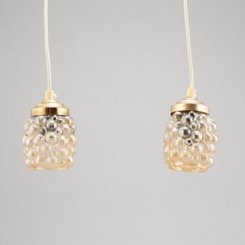 Helena Tynell, a glass wall light and a pair of ceiling lights, Glasshütte Limburg, Germany.