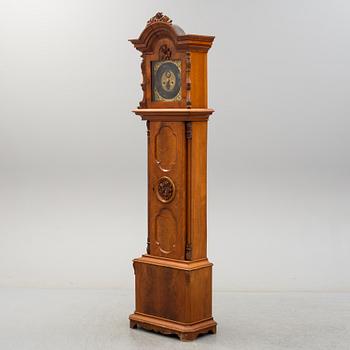 A 18th century long case clock.