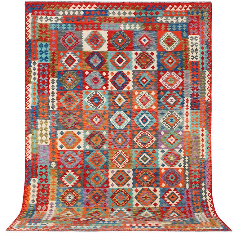 A Kilim carpet, c. 371 x 261 cm.