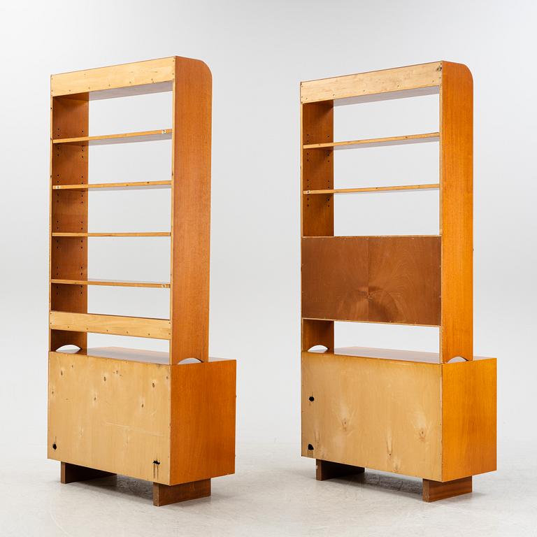 Josef Frank, two mahogany veneered bokkshelves, model 2112, Firma Svenskt Tenn, Sweden.