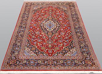 A semi-antique Keshan carpet, approx. 218 x 131 cm.