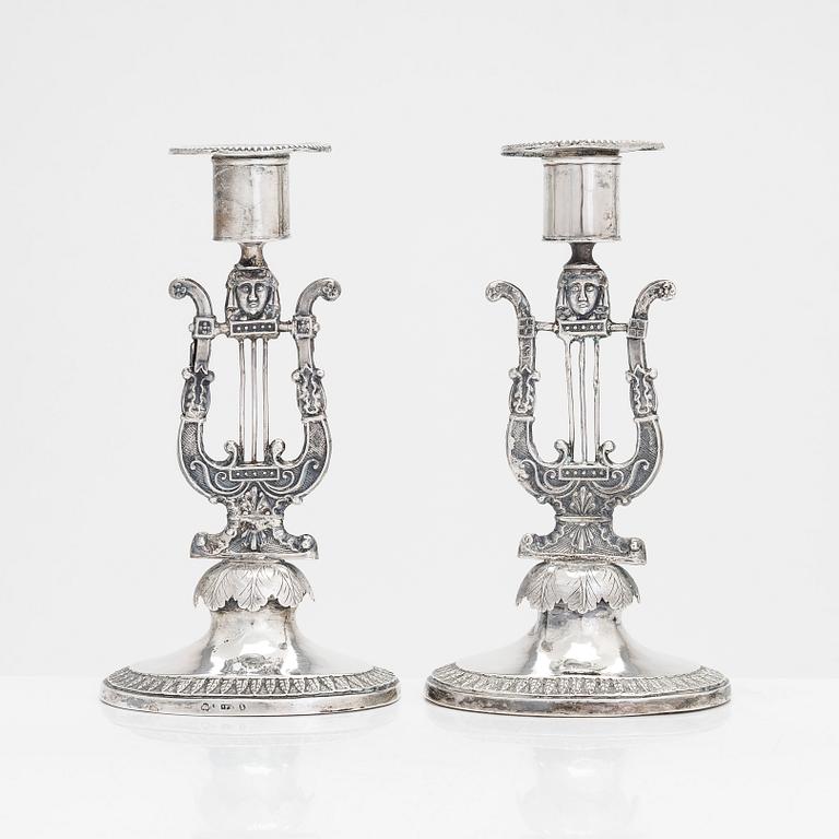 A pair of Empire silver candlesticks, maker marks of Johan Fredrik Hartman, Vasa, Finland 1827.
