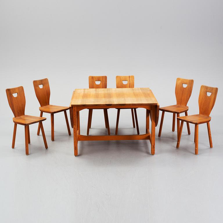 Carl Malmsten, a pine dining table and 6 chairs.