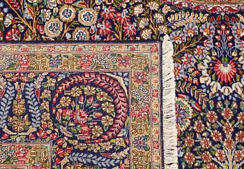 A carpet, Kirman Laver, 'Millefleur', c. 393 x 300 cm.