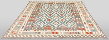 A Kilim carpet, c. 300 x 196 cm.