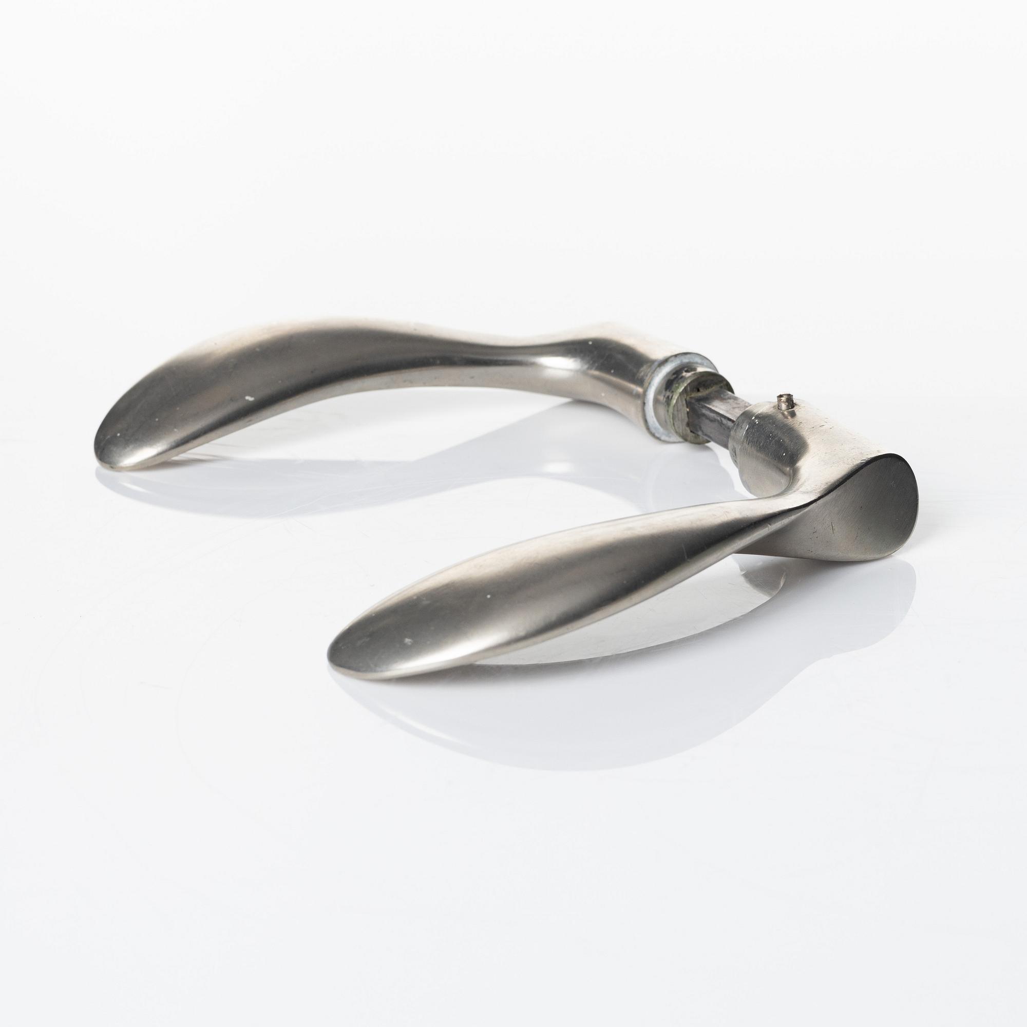 Arne Jacobsen, a door handle 'AJ-Grebet' for SAS Royal Hotel, Copenhagen 1956, executed by Carl F Petersen.