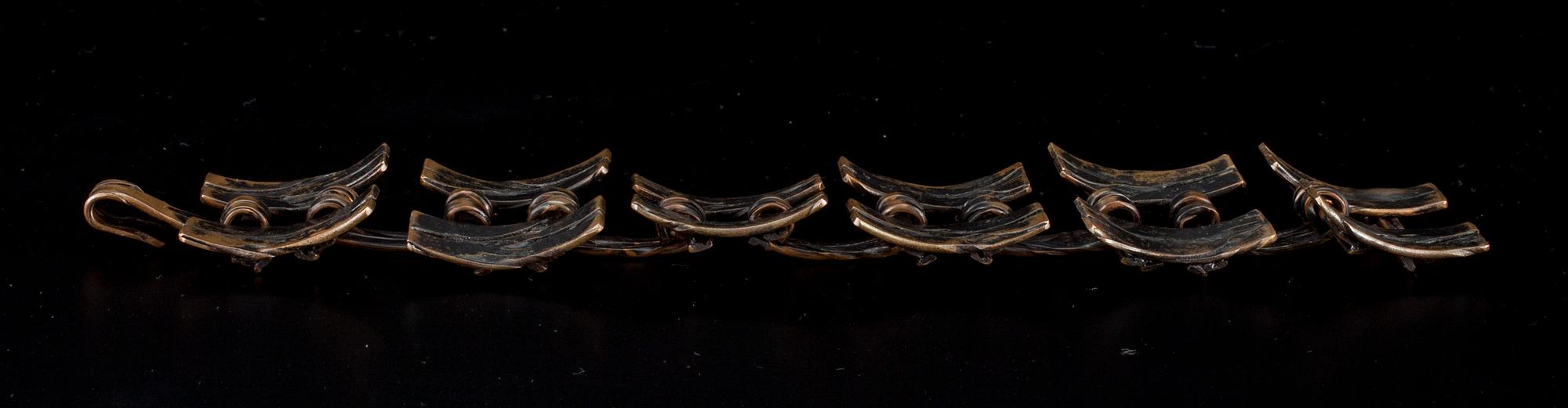 ARMSMYCKE, brons, Finland 1970-tal.