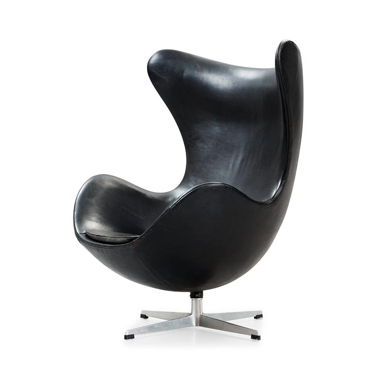 An Arne Jacobsen black leather 'Egg' chair, Fritz Hansen, Denmark 1964.