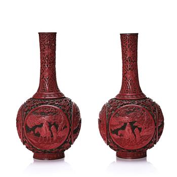 1004A. A pair of red lacquer vases, Qing dynasty (1644-1912).