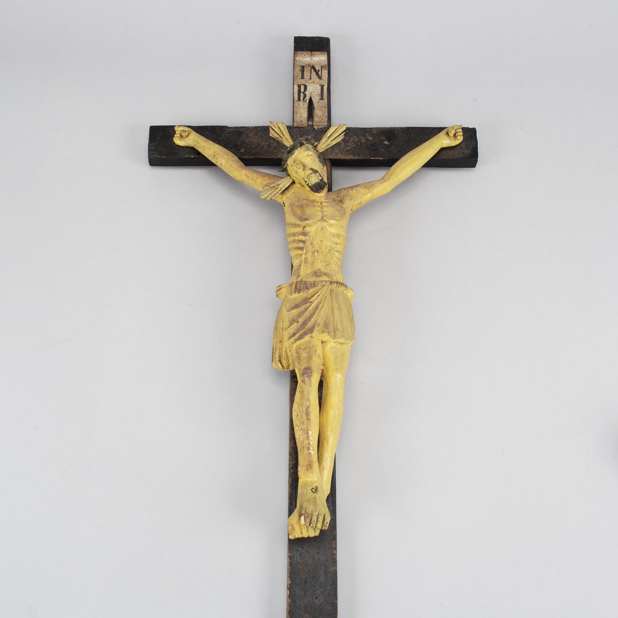 A wooden painted crucifix, 18th/19th century.