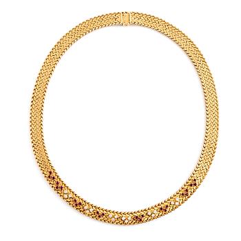 An 18K gold necklace set with round brilliant-cut diamonds and rubies.