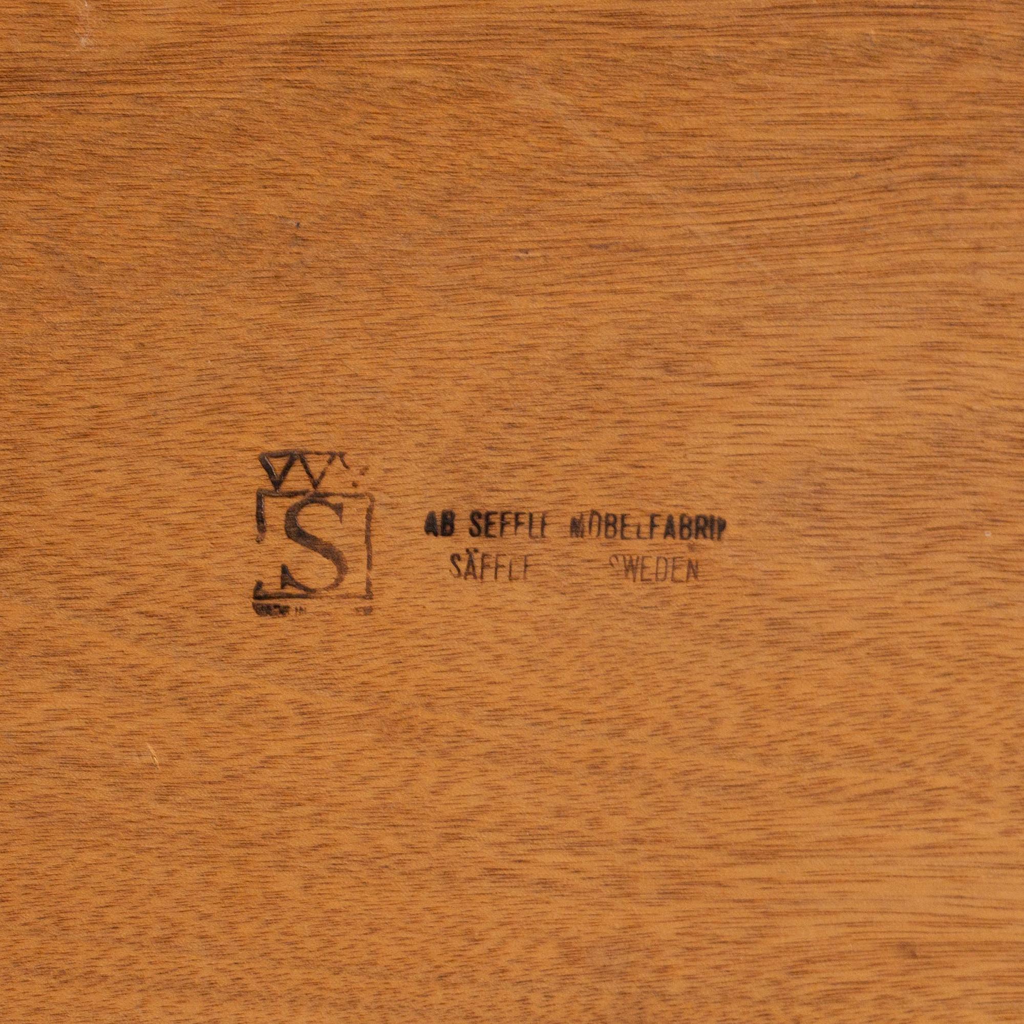 A walnut veneered coffee table from Seffle Möbelfabrik, mid 20th Century.