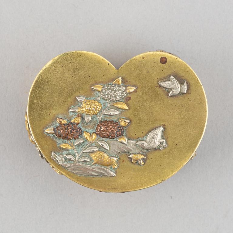 A lidded heart shaped brass box with cover, Meiji period (1868-1912), around the year 1900.