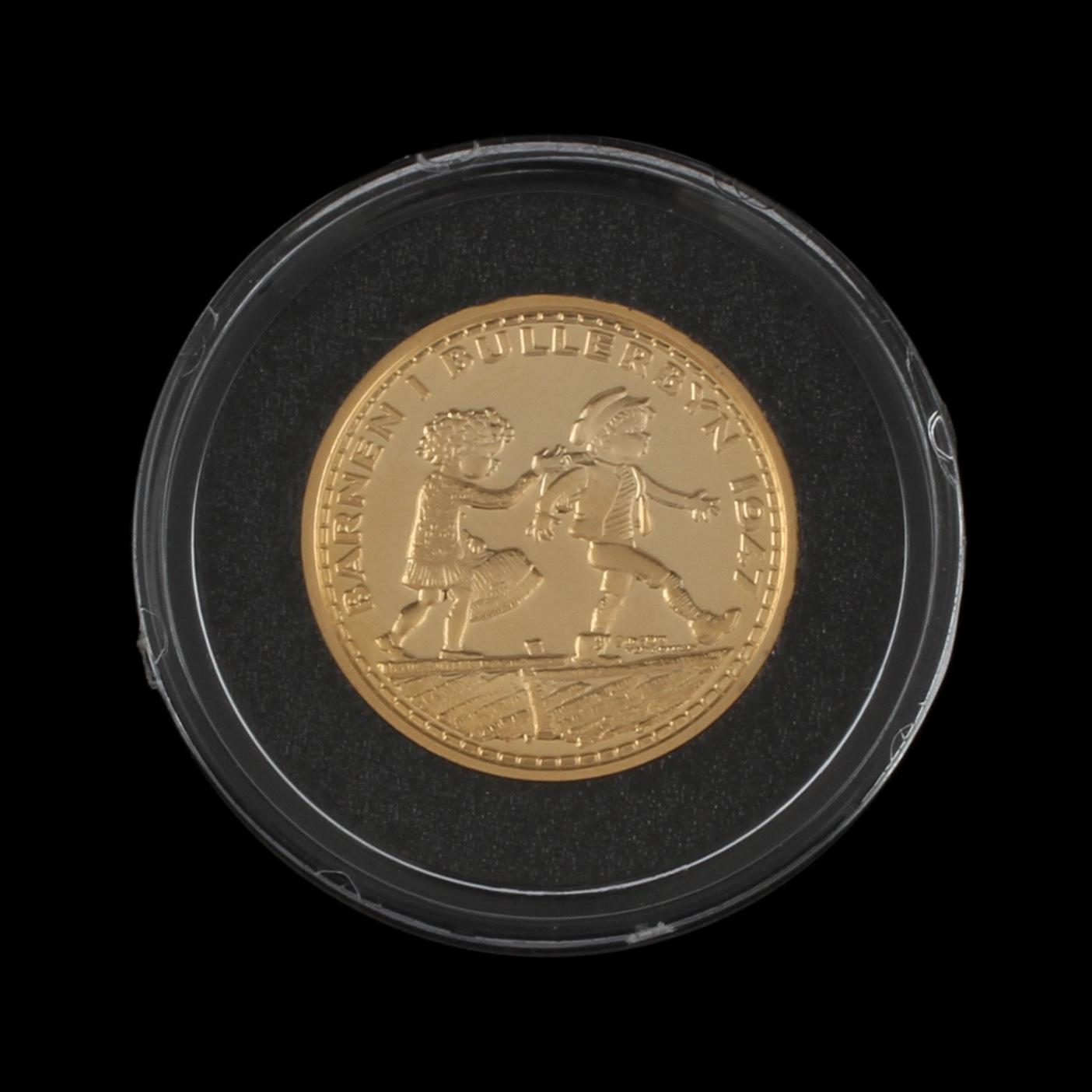 MYNT, 24 k guld, "Barnen i bullerbyn 1947". Vikt ca 9 g.