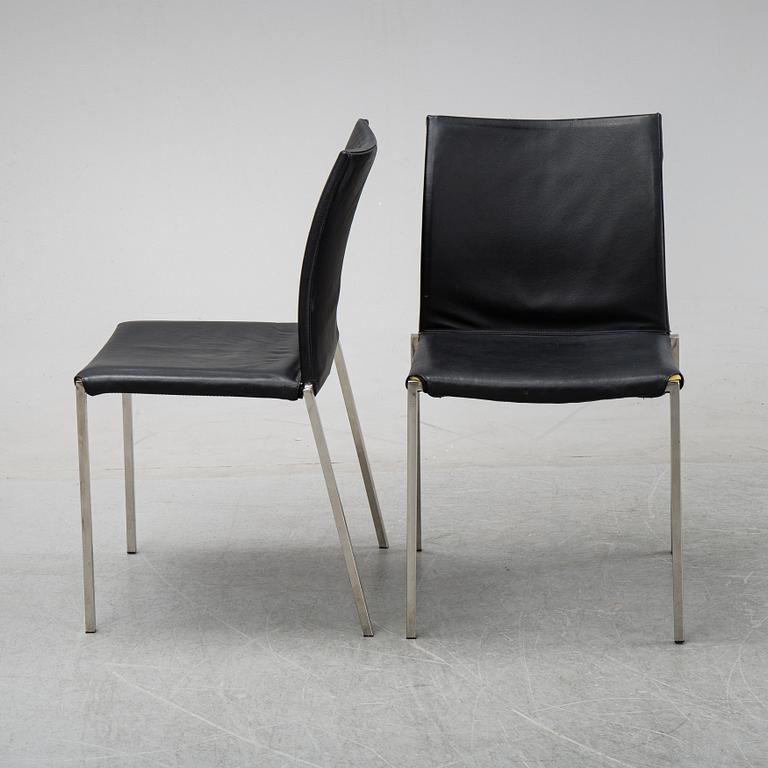 A set of eight steel and leather chairs, 21th century.