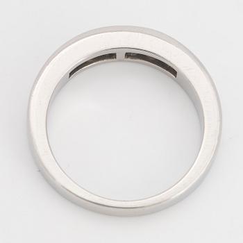 Platinum and six princess-cut diamond ring.