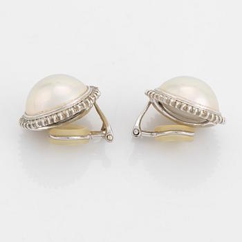 Mabe pearl and brilliant cut diamond earrings.