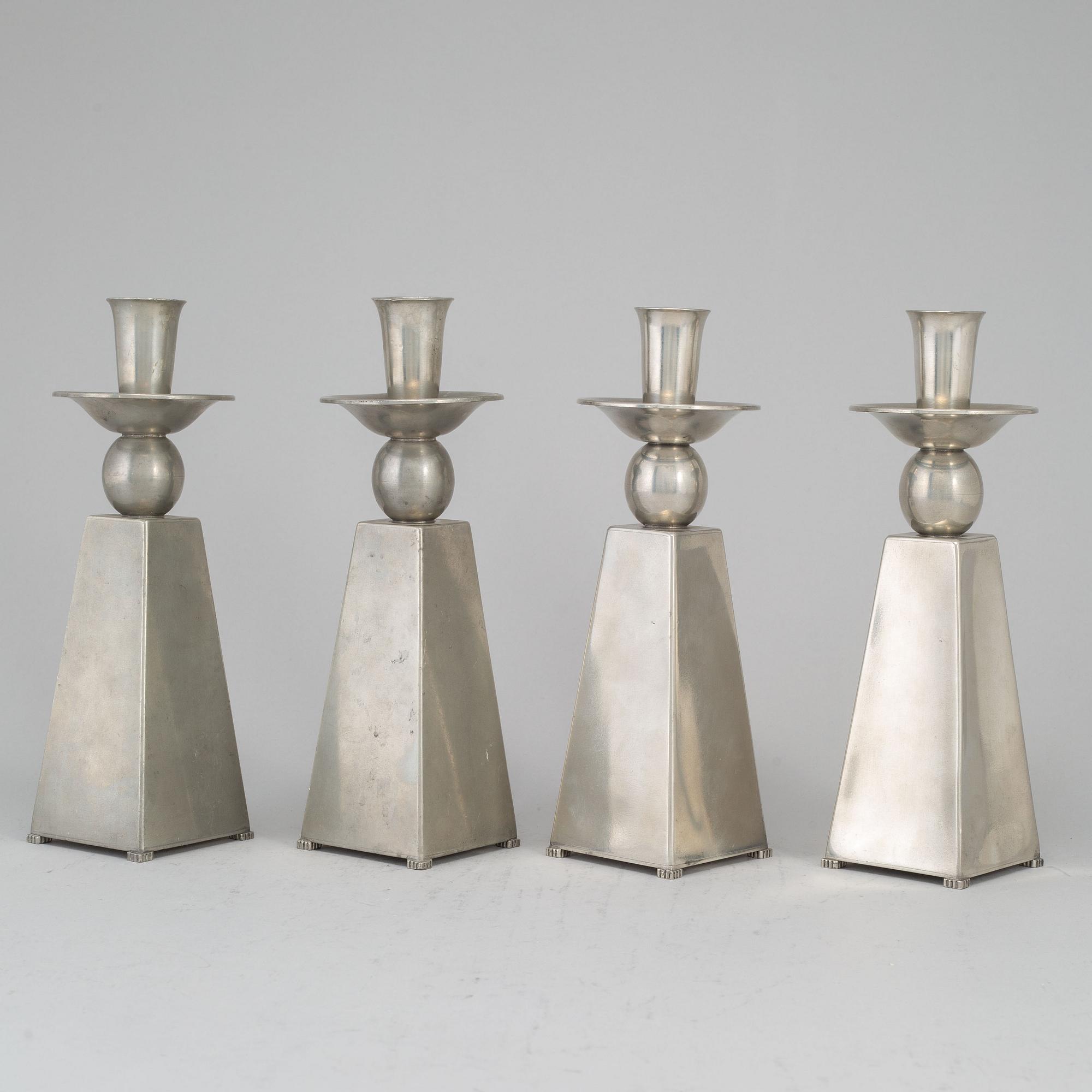 GAB (Guldsmedsaktiebolaget) TENN, a set of four pewter candlesticks, Stockholm 1950's.