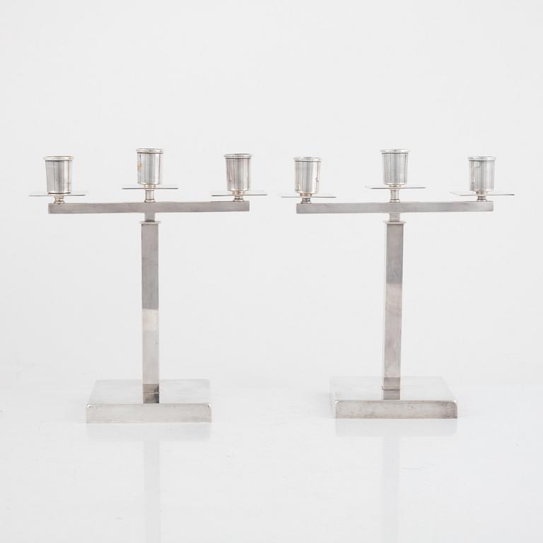 Rolf Engströmer, attributed to, a pair of silver-plated candelabra, Fabriksaktiebolaget Kronsilver, Sweden 1930s.