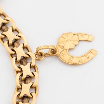 Armband, x-länk, 18K guld, med berlocker.