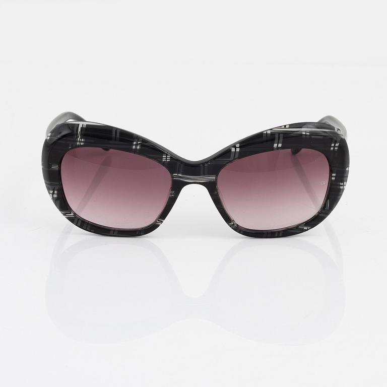 Oliver Goldsmith, a pair of sunglasses.