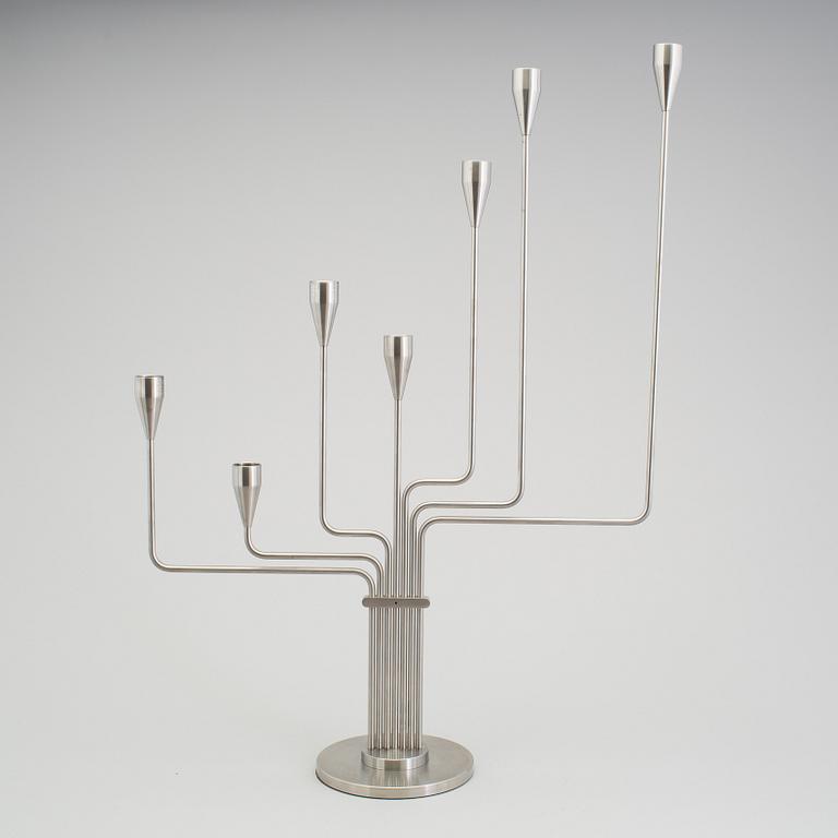 PIET HEIN, a stainless steel candelabrum, 21st Century.