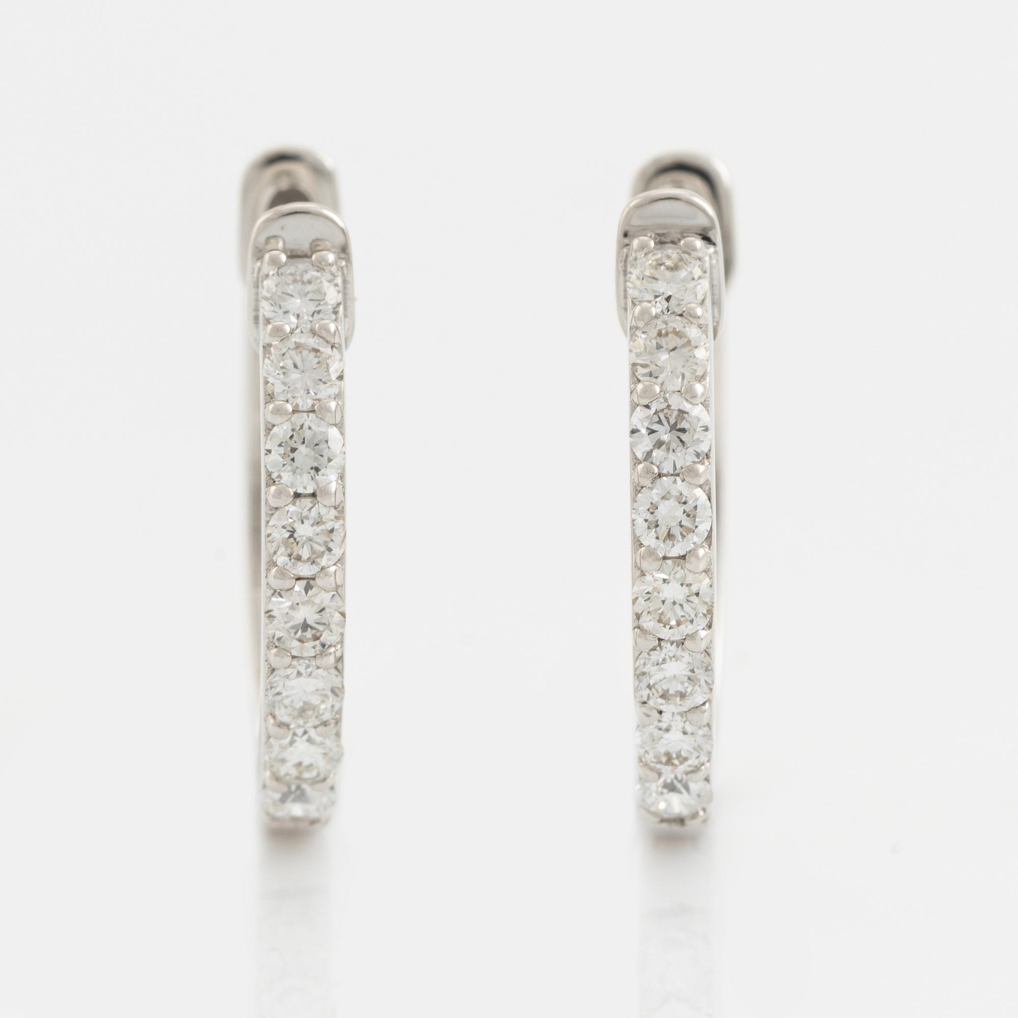 Brilliant cut diamond hoop earrings, total 0,58 ct.