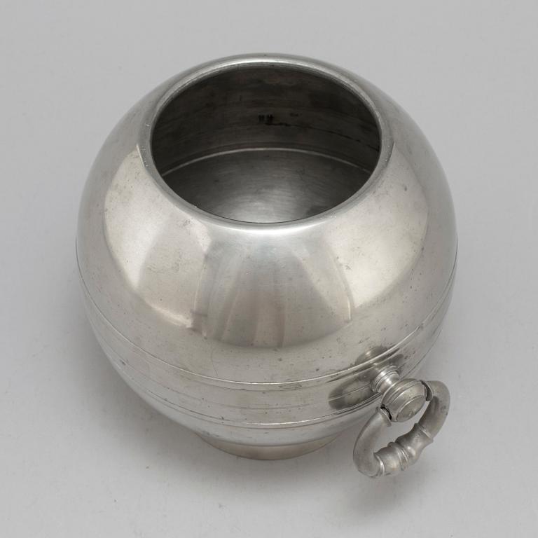 A 1935 pewter wine cooler by GAB.