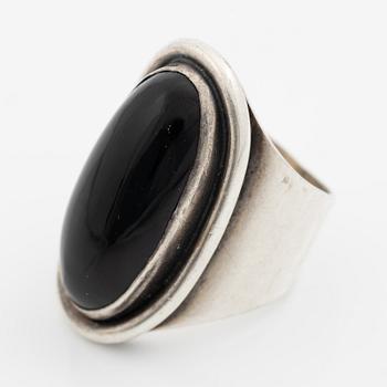 Ring, Carl Ove Frydensberg, silver with cabochon-cut black stone, Denmark.