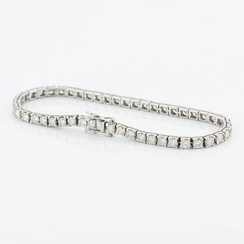 Tennisarmband, vitguld med briljantslipade diamanter, totalt ca 4,80 ct.