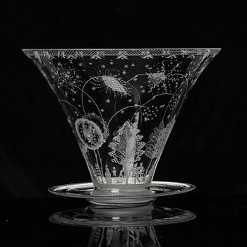 Edward Hald, a Swedish Grace "Fyrverkeri" (Fireworks) engraved glass bowl with a plate, Orrefors, Sweden, 1925, model 248.