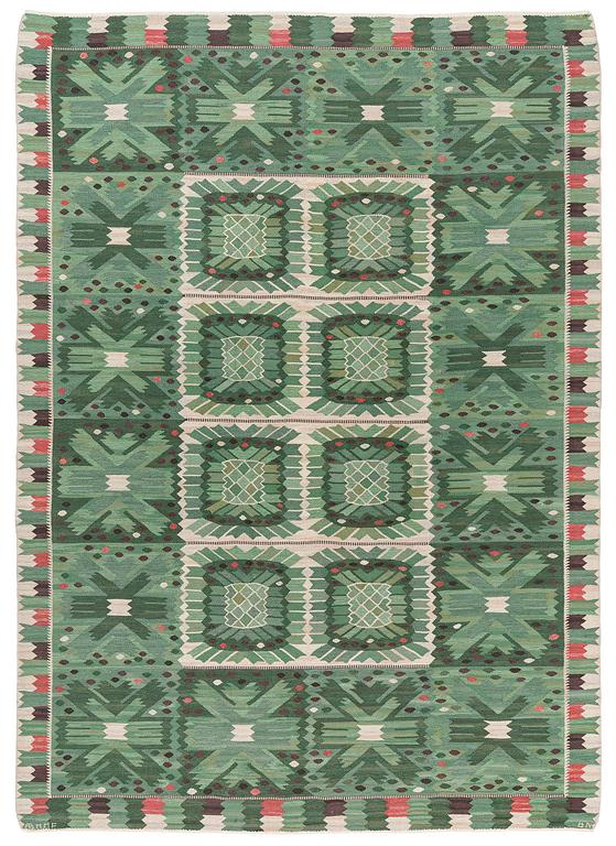 Barbro Nilsson, a carpet 'Nejlikan grön', flat weave, c. 390 x 278 cm, signed AB MMF BN.