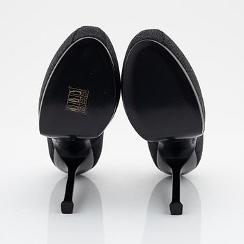 Yves Saint Laurent, a pair of black leather platform pumps, size 36 1/2.