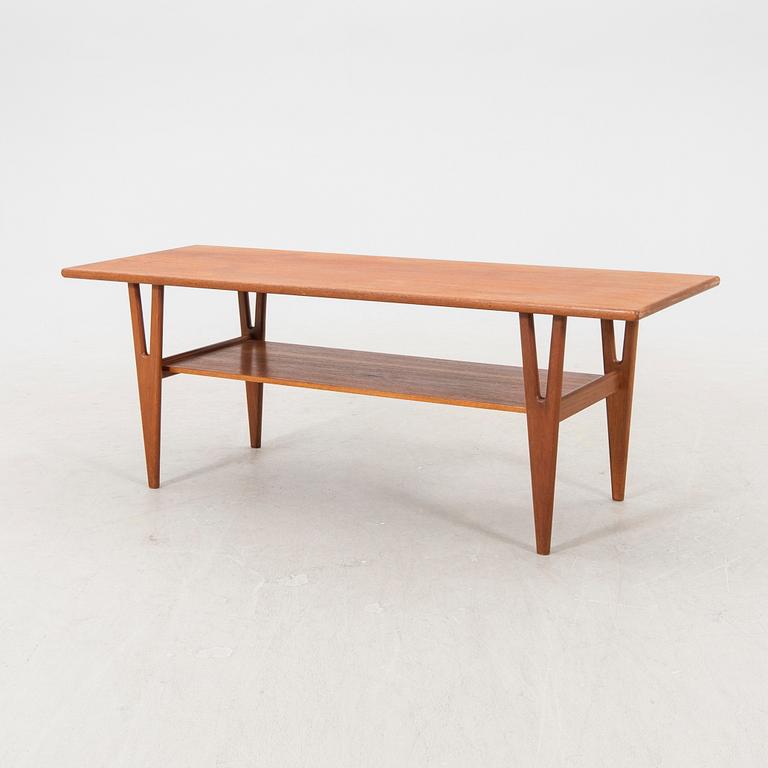 A 1960/70s teak coffee table.
