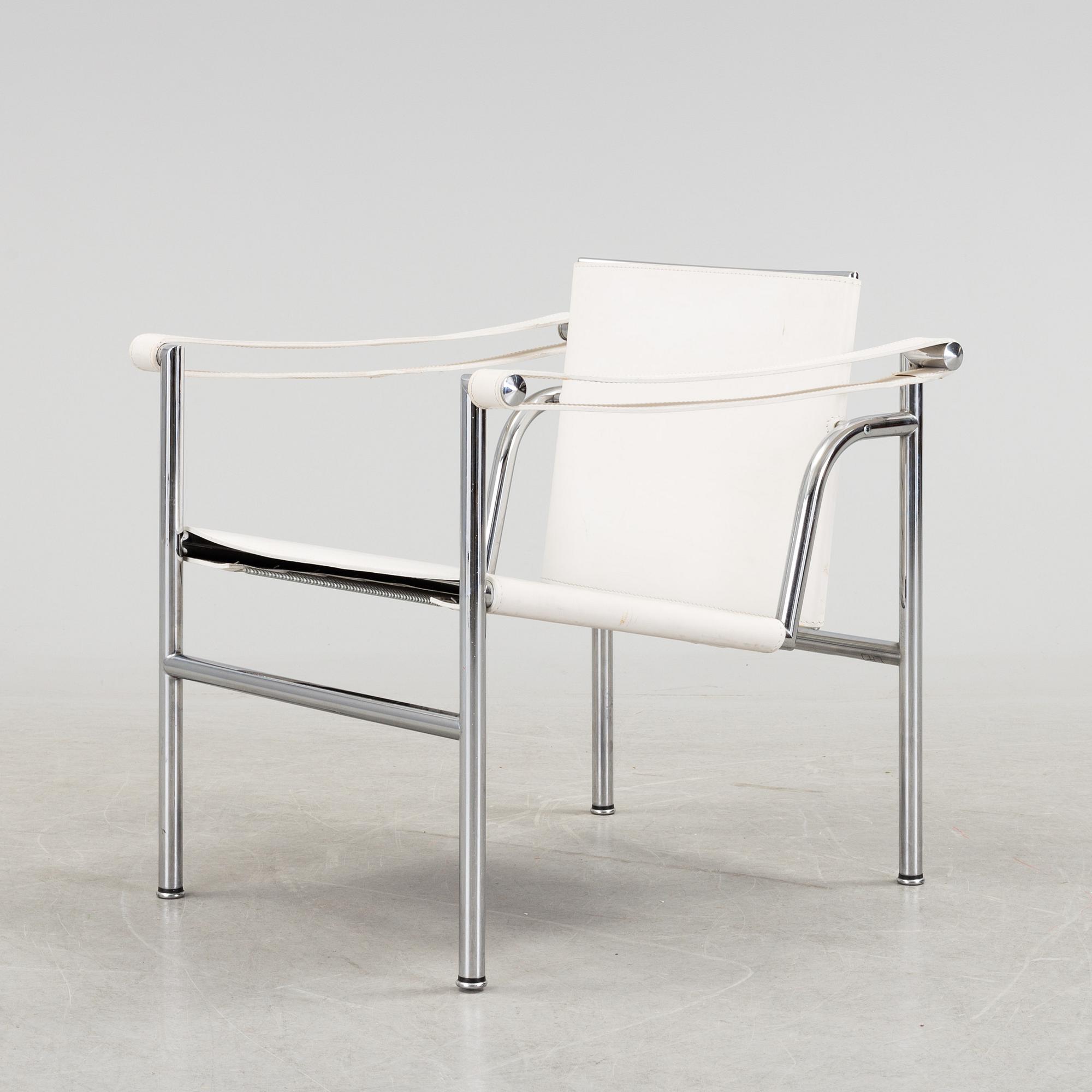 A "LC-1" ARMCHAIR DESIGNED BY LE CORBUSIER FOR CASSINA.