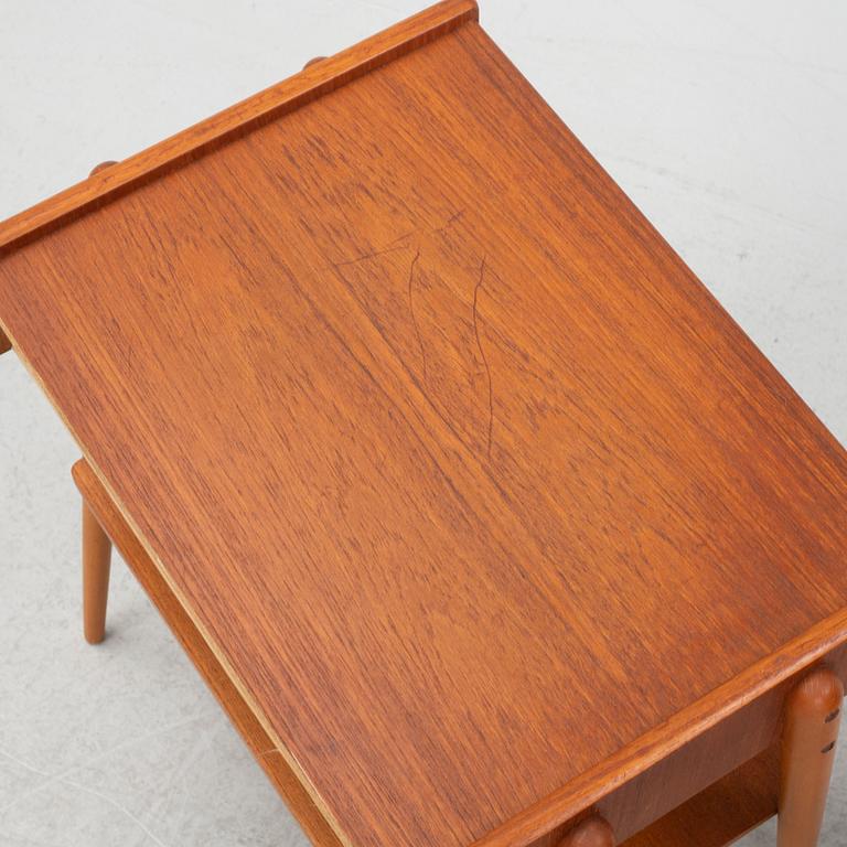A pair of teak bedside tables, 1950's/60's.
