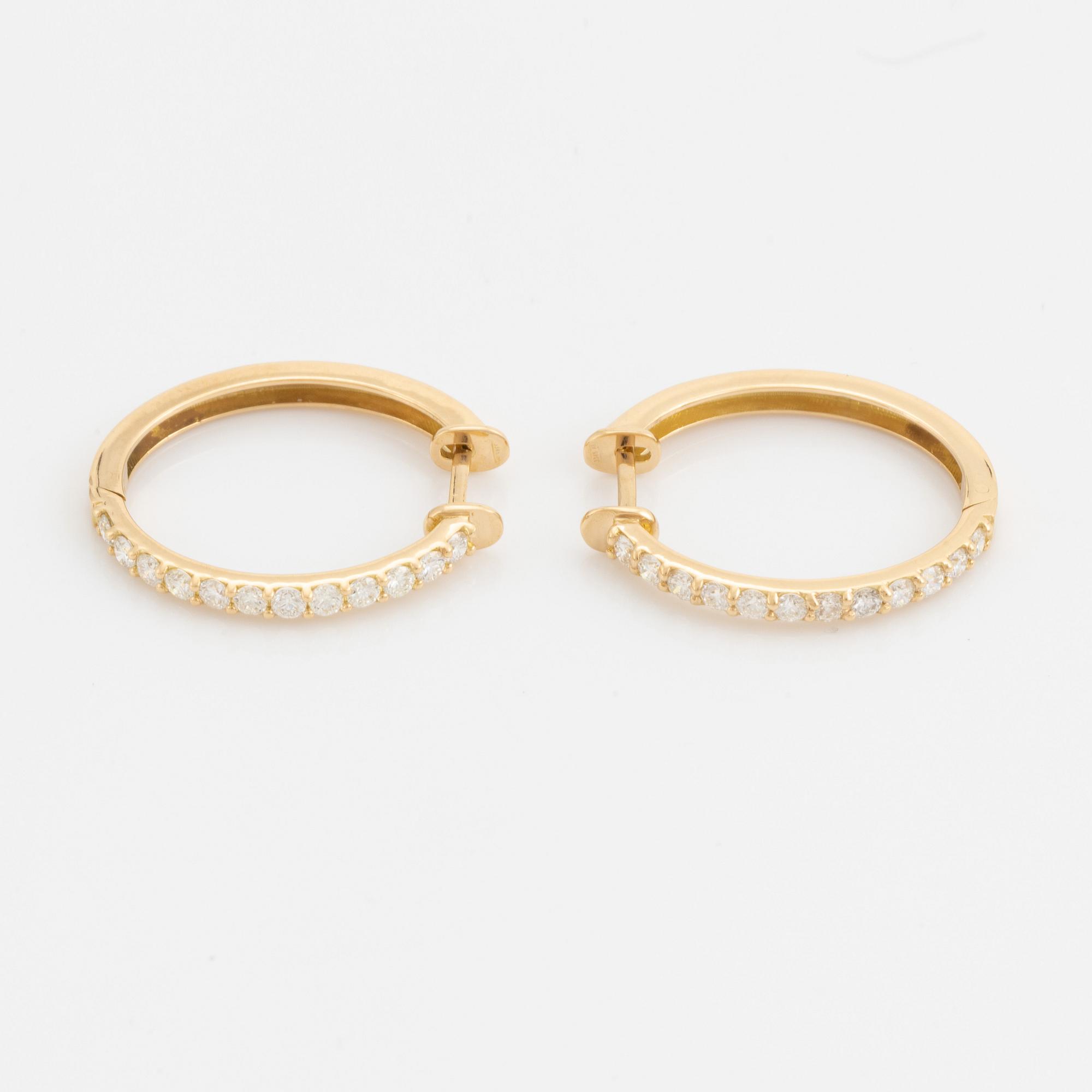 Brilliant cut diamond hoop earrings.