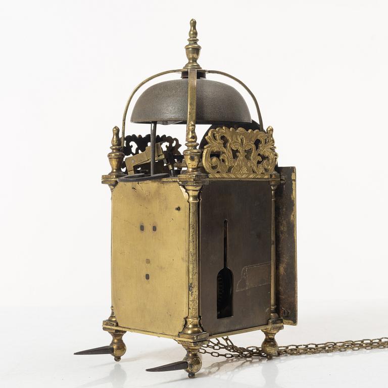 A George II brass lantern clock by John Wainwright (watchmaker in Wellingborough 1738-51).