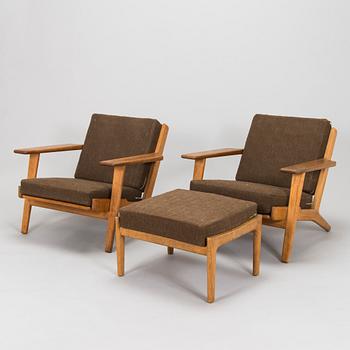 Hans J. Wegner, a pair of 'GE 290' armchairs with ottoman for Getama, Gedsted, Denmark.