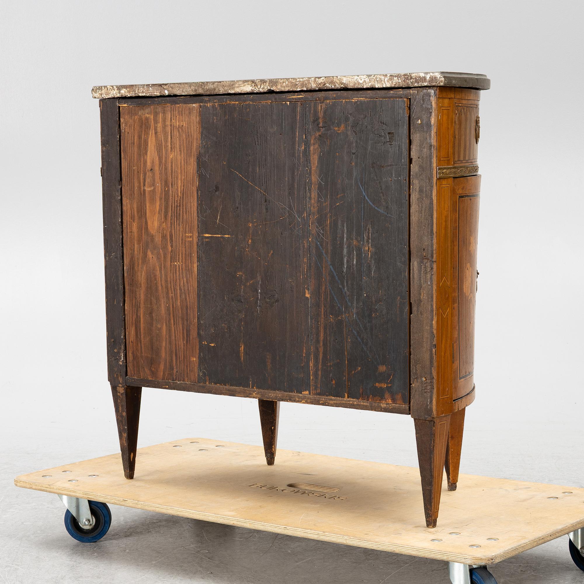 A Louis XVI style chest of drawers, 19th century.