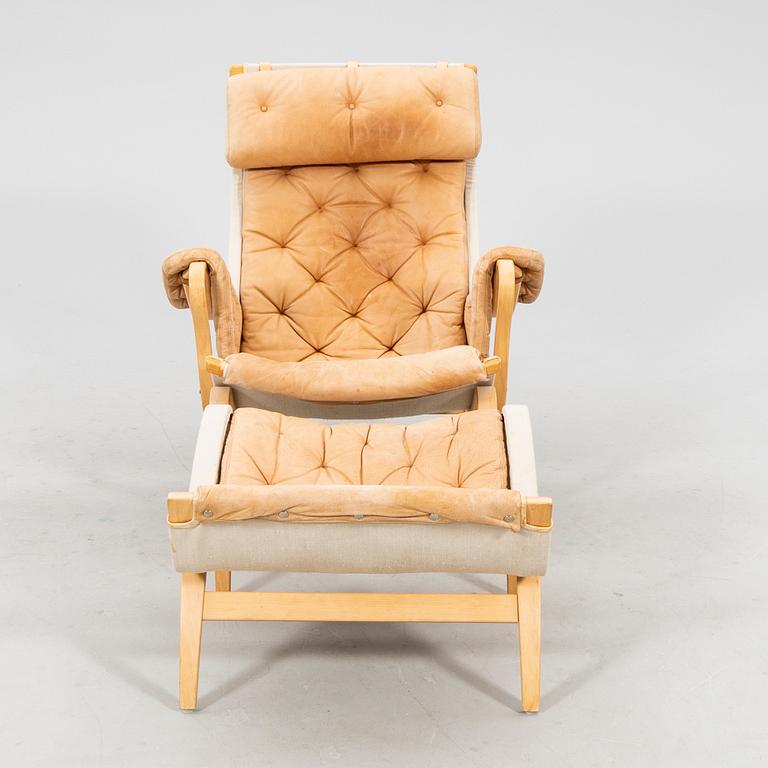Bruno Mathsson, armchair with footstool "Pernilla" DUX late 20th century.