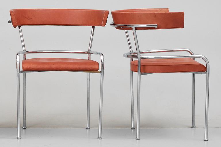 A pair of Gunnar Asplund chromed steel and leather armchairs by Källemo Sweden.