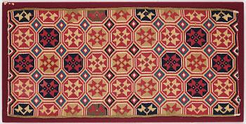 A CARRIAGE CUSHION, double-interlocked tapestry, "Stjärnmönster", ca 43,5-44,5 x 94-95 cm, Scania (Sweden).