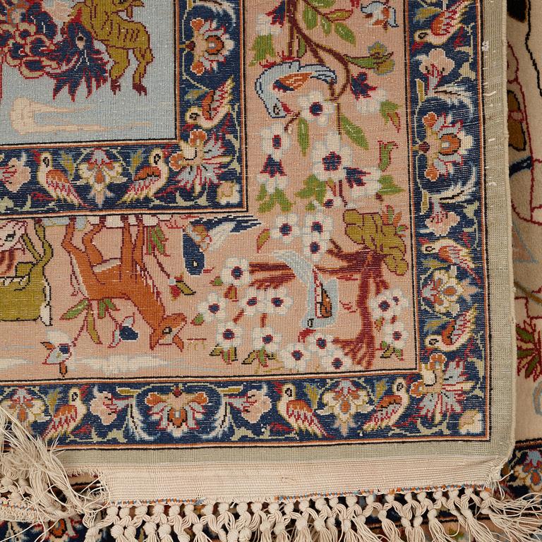 A rug, semi-antique/Old Esfahan figural, signed, ca 154,5 x 106,5 cm ( ca 2,5-3,5 cm flat weave at the ends).