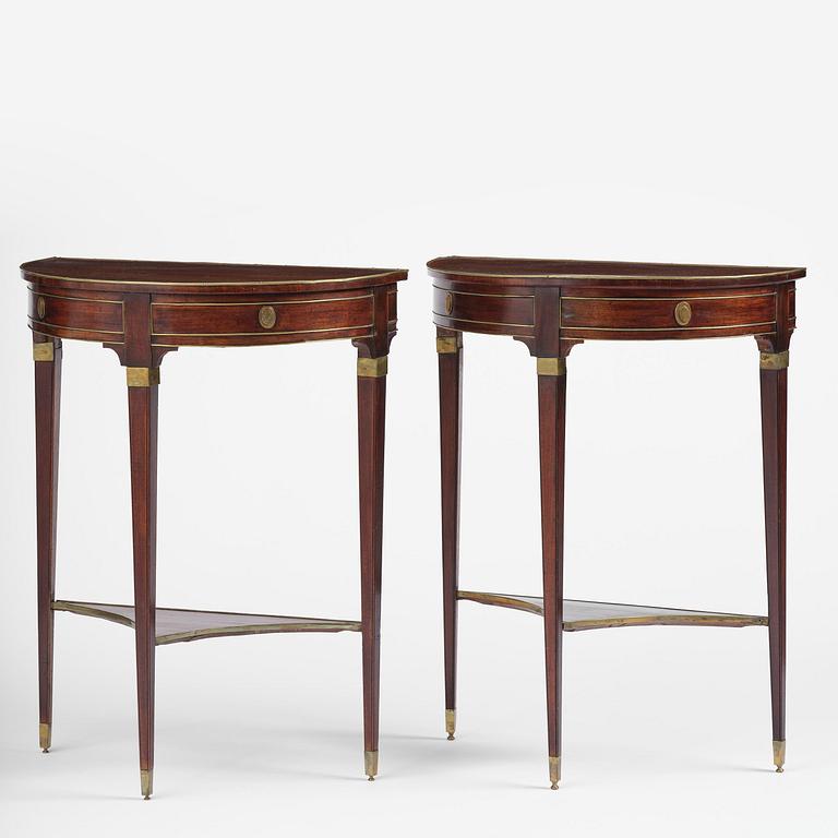 A pair of late Gustavian mahogany consoles in the manner of A. Lundelius, Stochkolm, late 18th century.