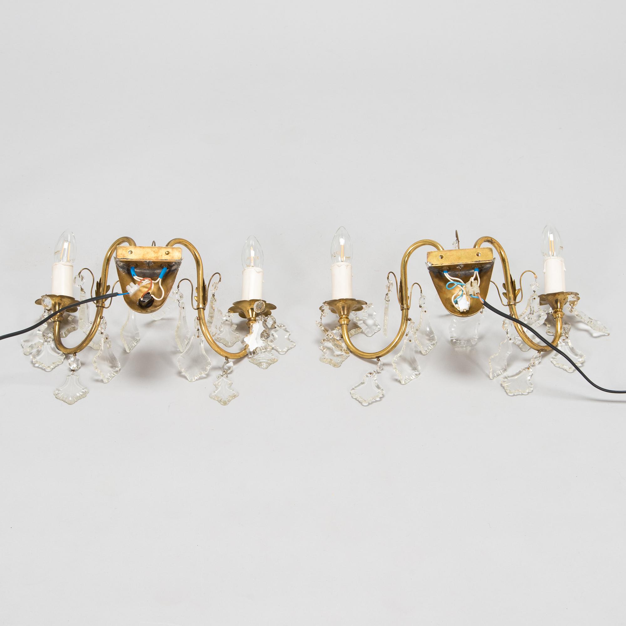 Mauri Almari, a pair of mid-20th-century brass wall sconces for Idman.