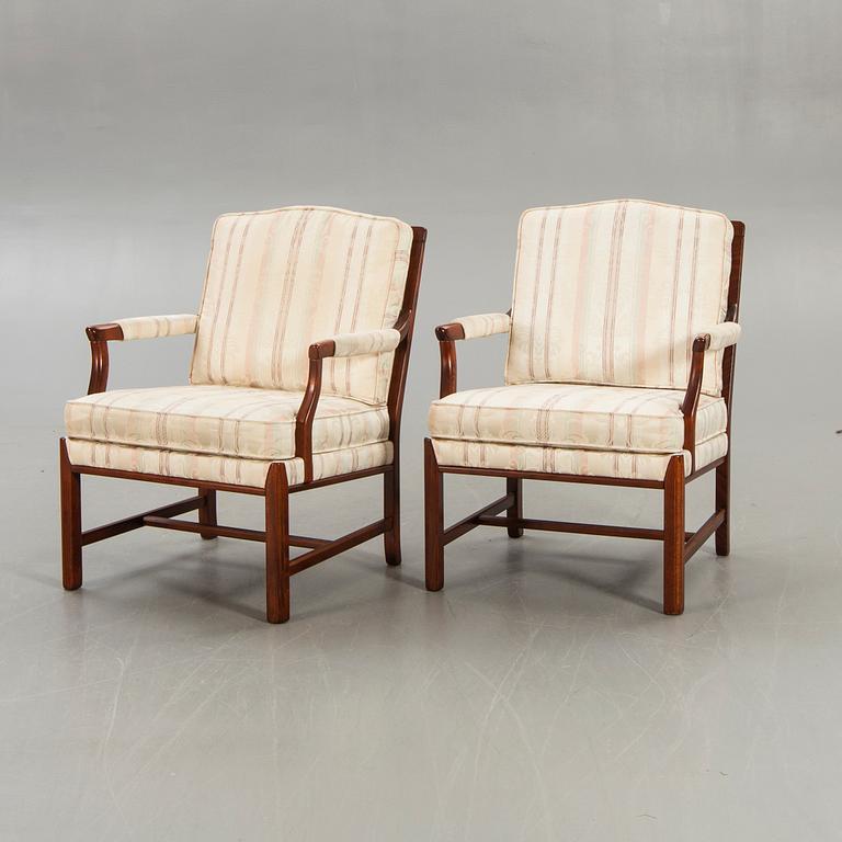 A pair of Ellinor armchairs from Bröderna Andersson later part of the 20th century.