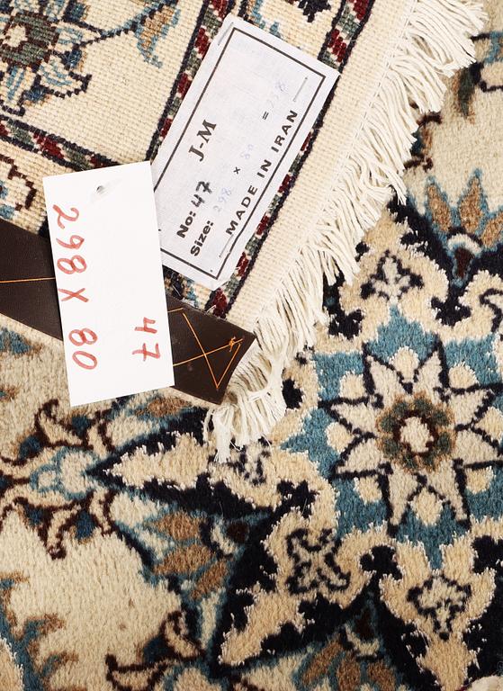 A Nain runner carpet, part silk, c. 298 x 80 cm.