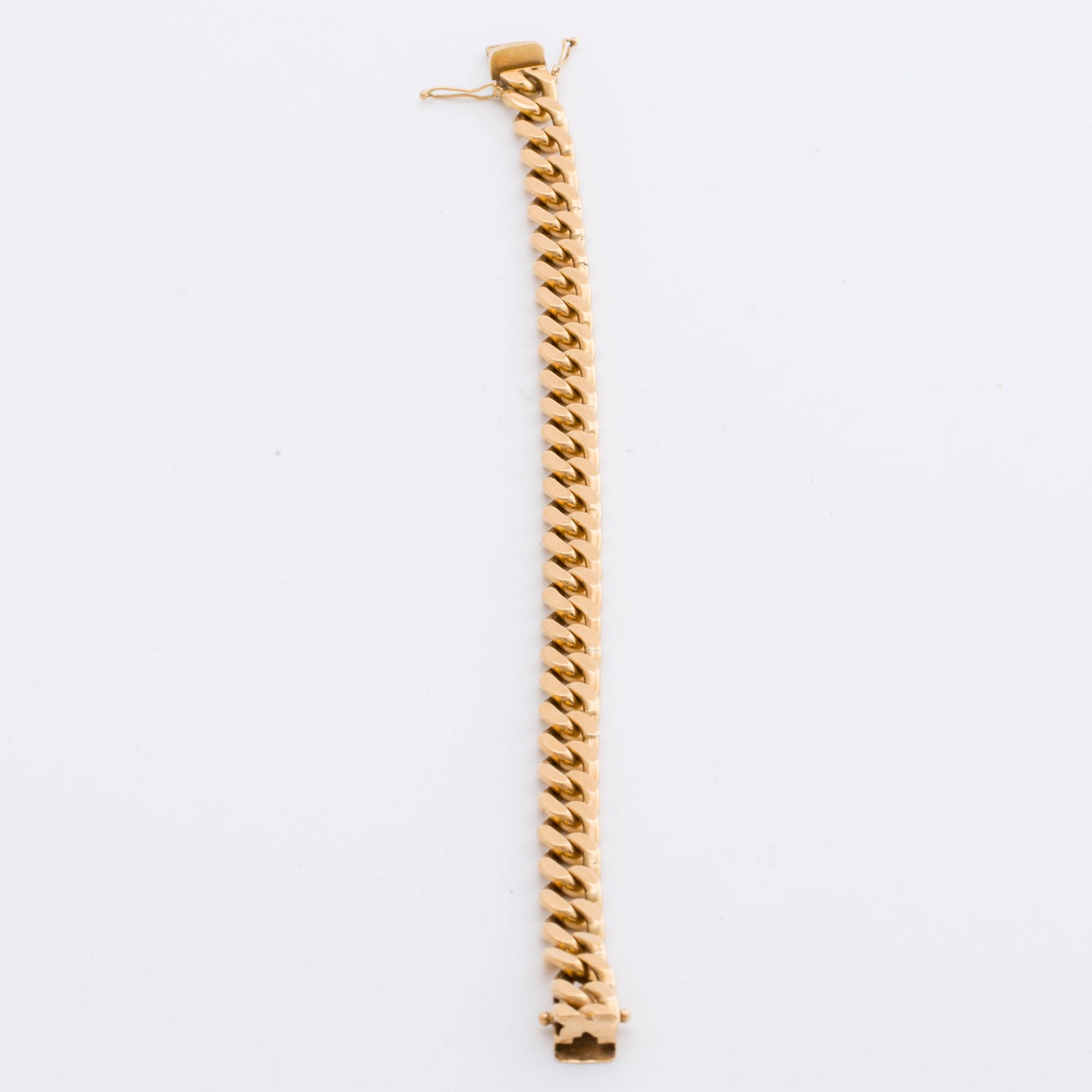 ARMBAND 18K guld pansarlänk, 57,0 g,  Jo-Ans Guld Köping 1978.