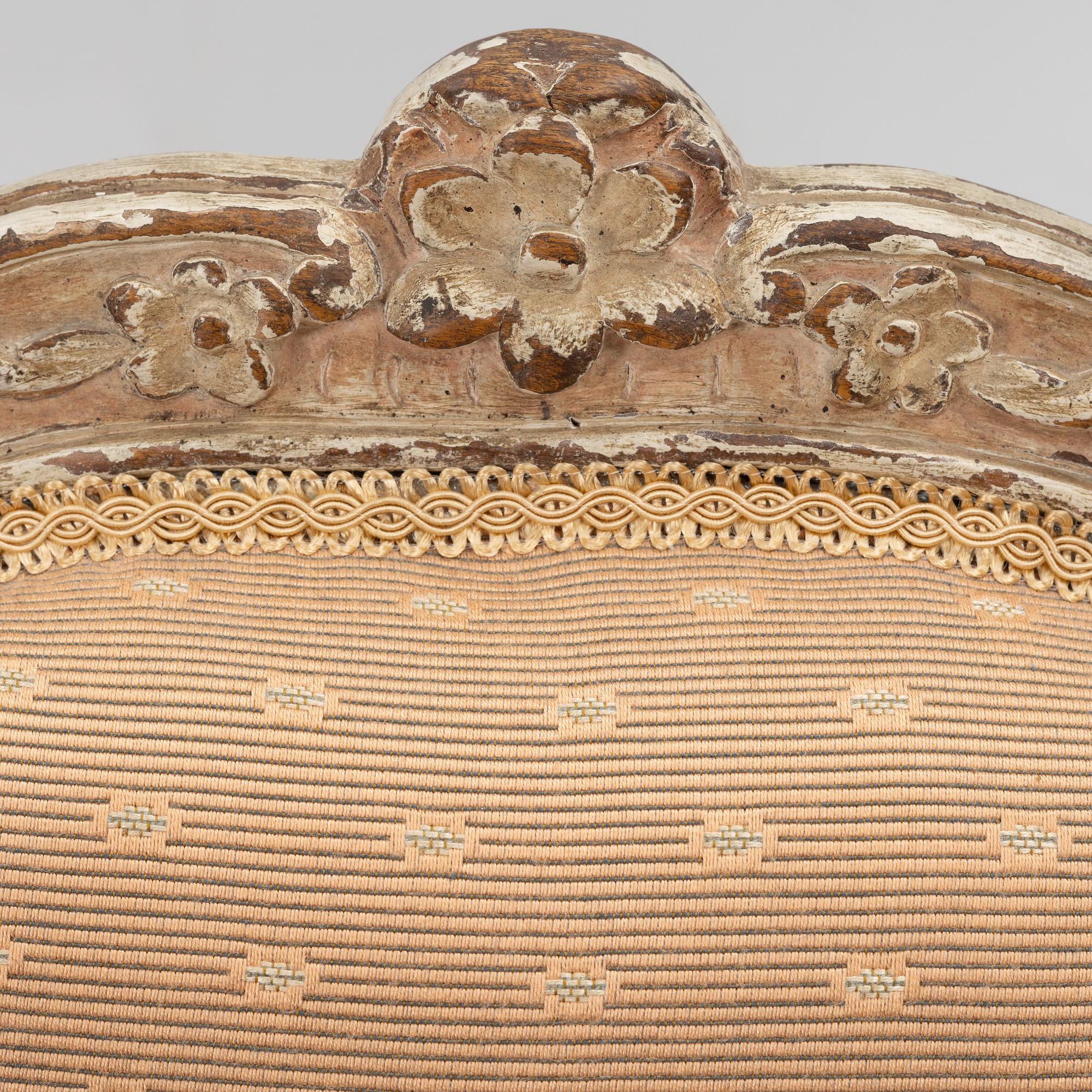 A matched pair of French Louis XV chairs, mid 18th Century.